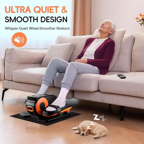 Elderly woman relaxing on beige sofa using quiet under-desk elliptical machine with sleeping puppy nearby