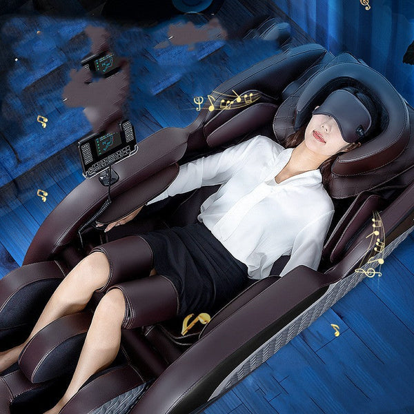 Woman relaxing in brown leather smart massage chair with foot and leg massagers and eye mask